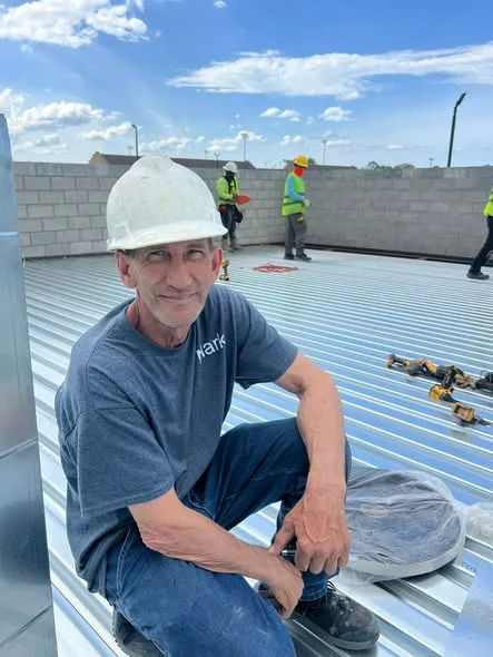 Fleck's Services team member on a commercial job site